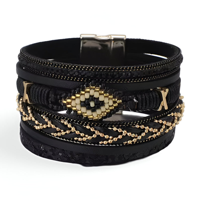 Bracelet multi-rangs noir avec perles dorées et détail losange central en perles noir et doré.