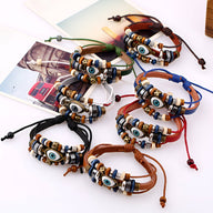 Bracelet multi-rangs en cuir avec perles, œil de protection bleu, fermeture réglable, coloris variés (noir, marron, rouge,.