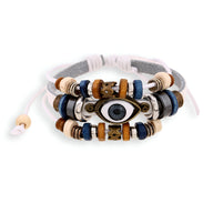 Bracelet multi-rangs en cuir marron et beige avec perles bleues, blanches, et pendentif œil de protection noir et blanc.