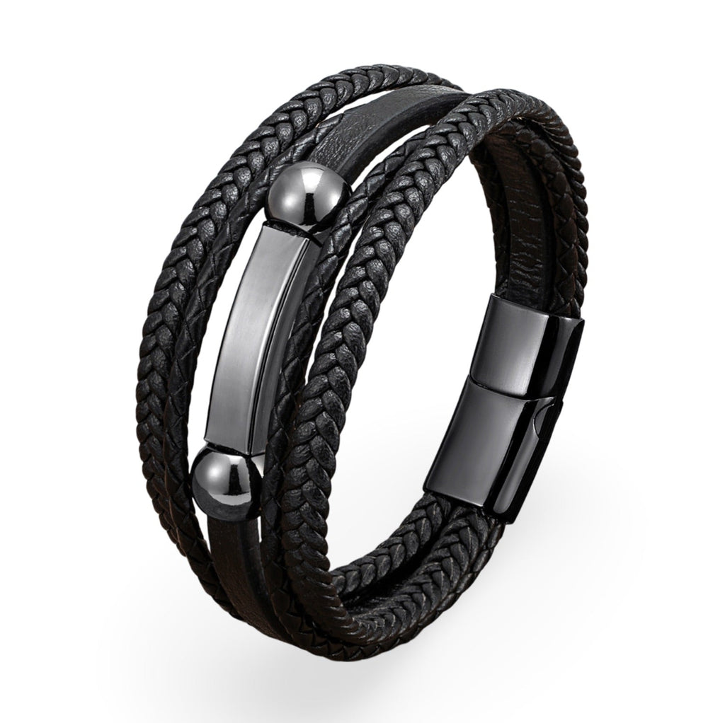Bracelet multi-rangs homme en microfibre noire tressée avec détails métalliques gris et fermoir magnétique.