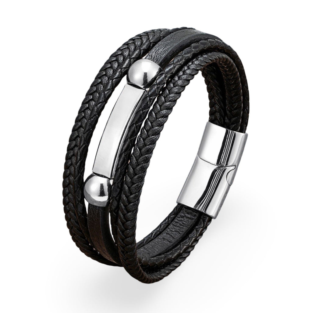 Bracelet multi-rangs en microfibre noire avec détails métalliques argentés et fermoir magnétique.