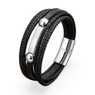 Bracelet multi-rangs en microfibre noire avec détails métalliques argentés et fermoir magnétique.