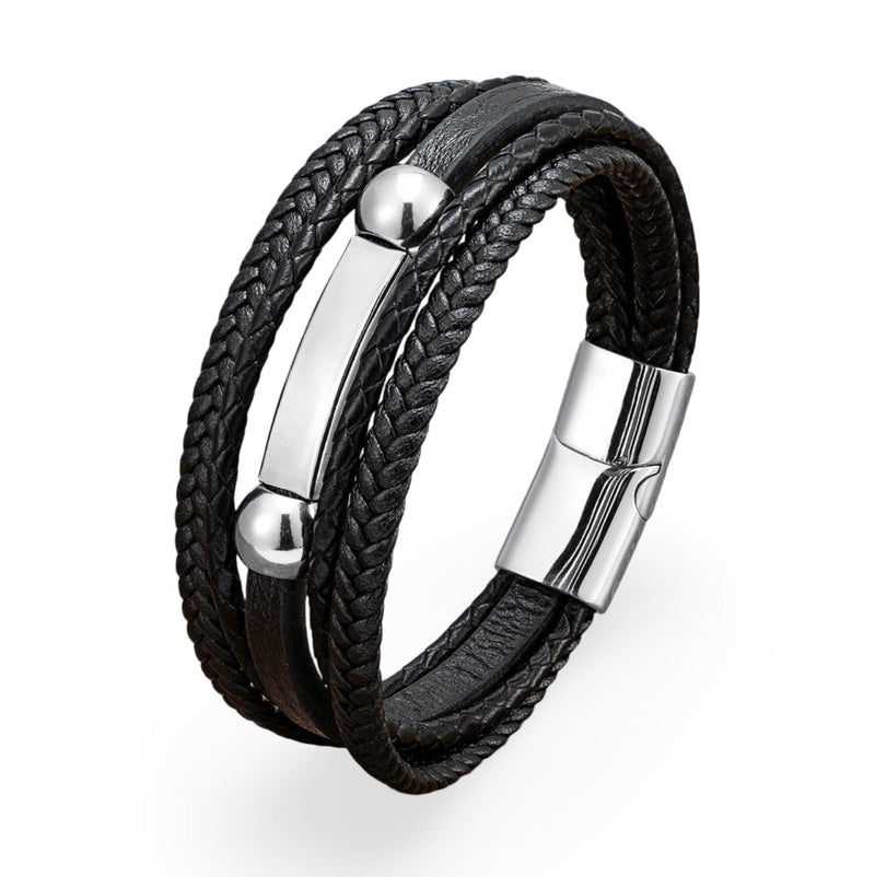 Bracelet multi-rangs en microfibre noire avec détails métalliques argentés et fermoir magnétique.