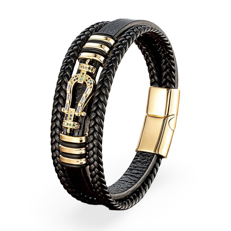 Bracelet multi-rangs noir en microfibre avec motif fer à cheval doré et fermoir aimanté doré.