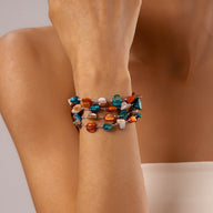 Bracelet multi - rangs, en titane et perles nacrées colorées, modèle Létunia - La Boutique du Bracelet