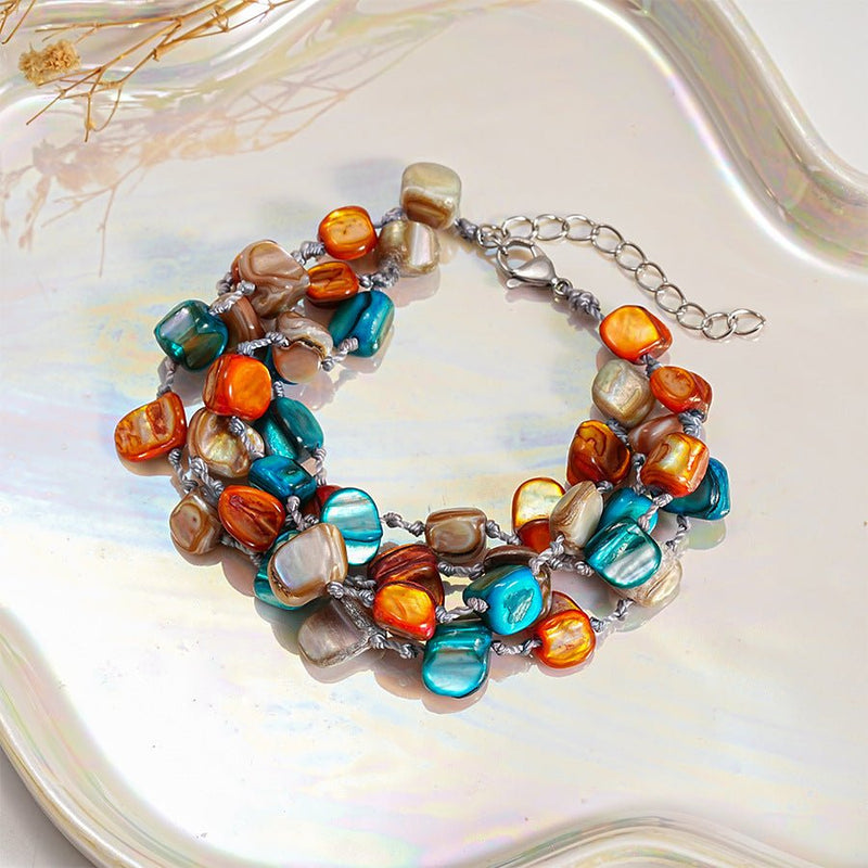 Bracelet multi - rangs, en titane et perles nacrées colorées, modèle Létunia - La Boutique du Bracelet