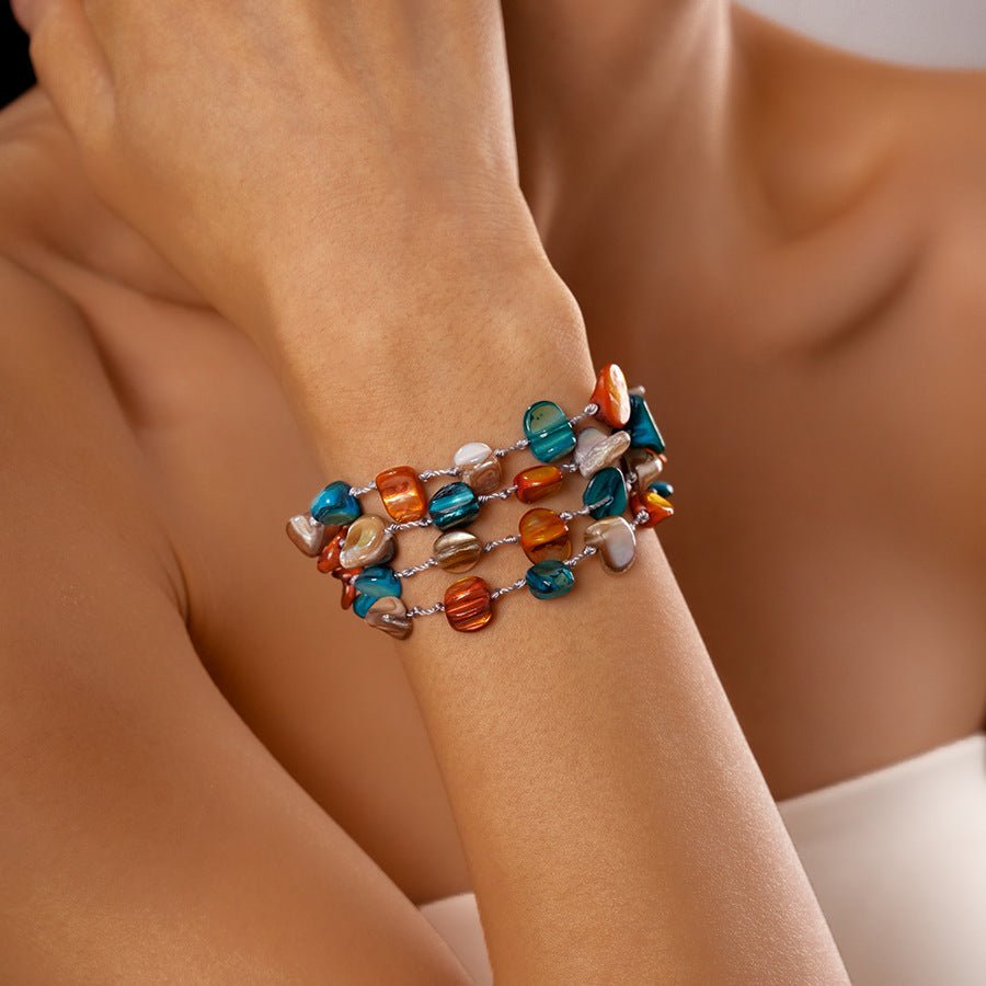 Bracelet multi - rangs, en titane et perles nacrées colorées, modèle Létunia - La Boutique du Bracelet