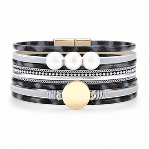 Packshot studio bracelet Saria Gris, vue de face sur fond blanc — 8 octobre 2026