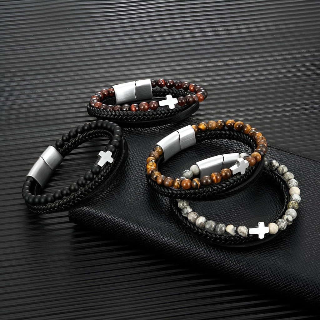 Bracelets multi-rangs homme avec pierres naturelles noires, océan de tigre et agate, croix métal argenté, fermoir magnétique.