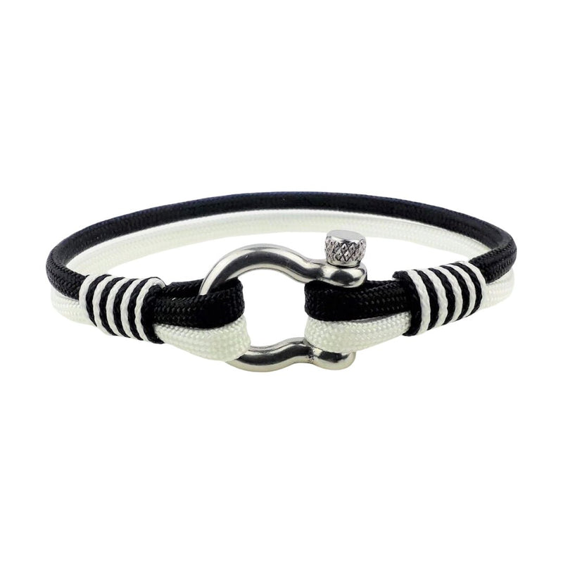 Bracelet nautique en nylon noir et blanc avec fermoir manille en acier inoxydable style breton élégant.