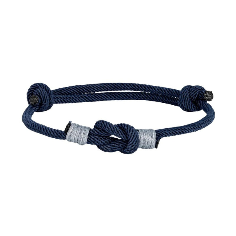 Bracelet noeud marin bleu marine en nylon avec ajustement coulissant et détails argentés.