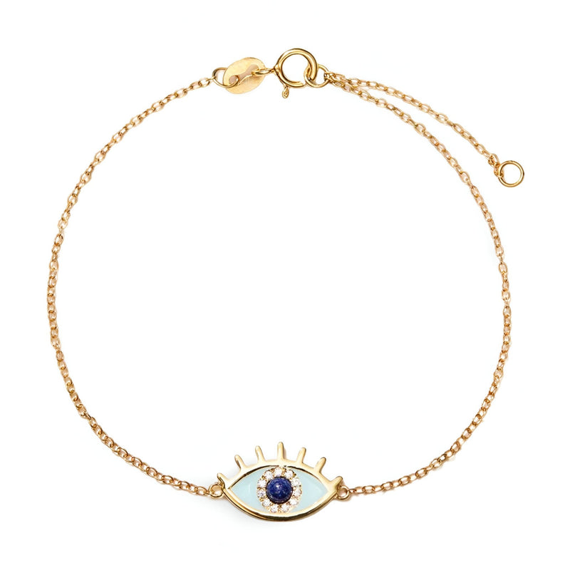 Bracelet en argent sterling doré avec pendentif œil bleu et cils stylisés.