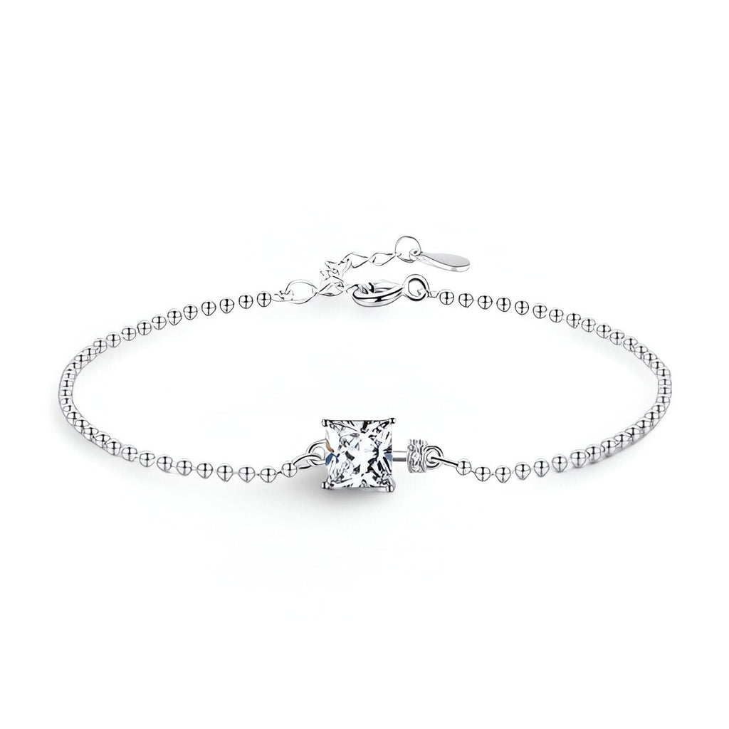 Bracelet fin en argent sterling avec chaîne à petites perles et pierre de tourmaline carrée transparente.