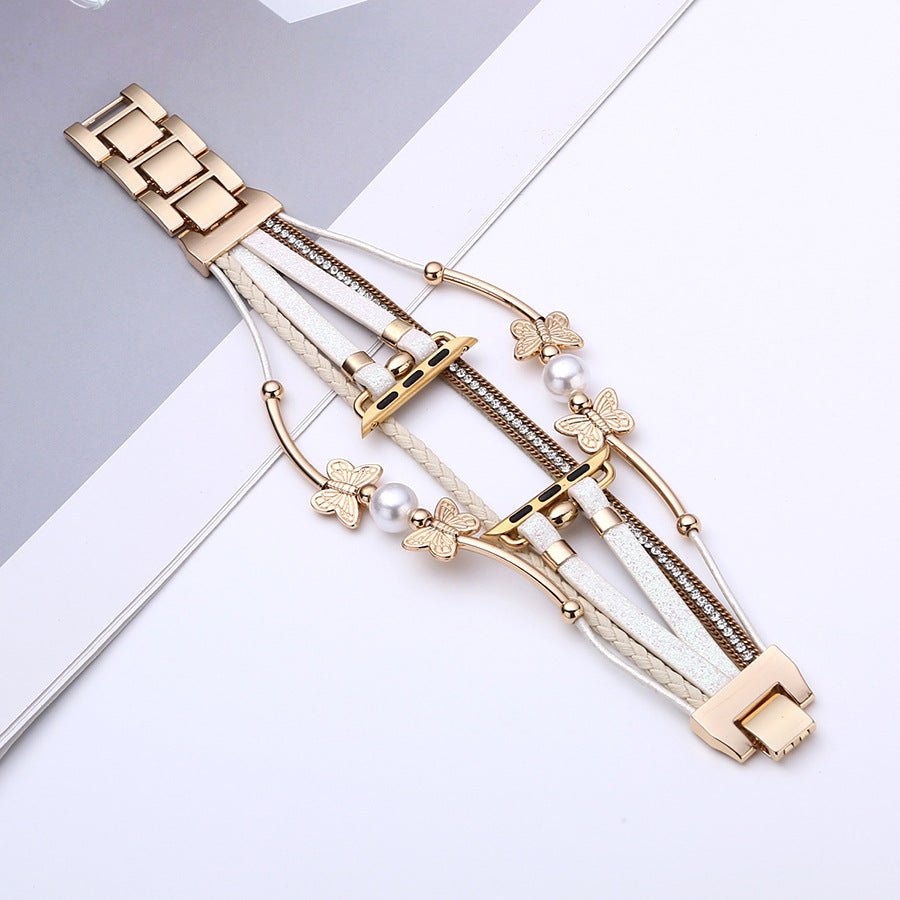Bracelet papillon pour Apple Watch en cuir beige multi-brins avec perles blanches et fermoir métallique doré élégant.