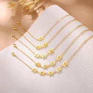 Bracelets en acier inoxydable doré avec pendentifs patte personnalisés, chaînes fines ajustables.