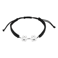 Bracelet noir en nylon avec deux pendentifs patte en acier inoxydable argenté personnalisés.