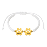 Bracelet en nylon blanc tressé avec pendentif patte en acier doré gravé "Benji" et "Milo".