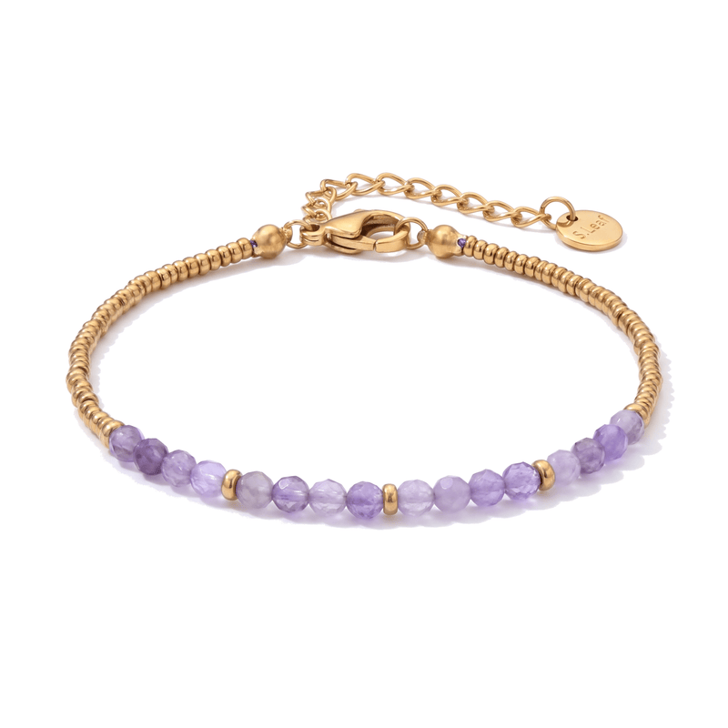 Packshot studio bracelet Dison Améthyste, vue frontale basse posée sur table, fond blanc pur — 9 octobre 2026