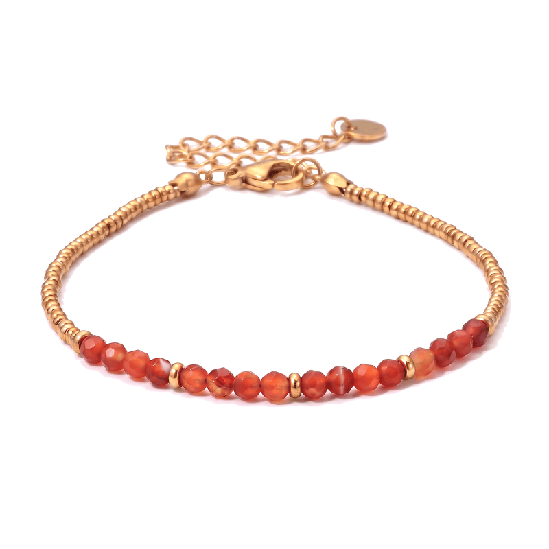 Packshot studio bracelet Dison Cornaline, vue frontale basse posée sur table, fond blanc pur — 9 octobre 2026