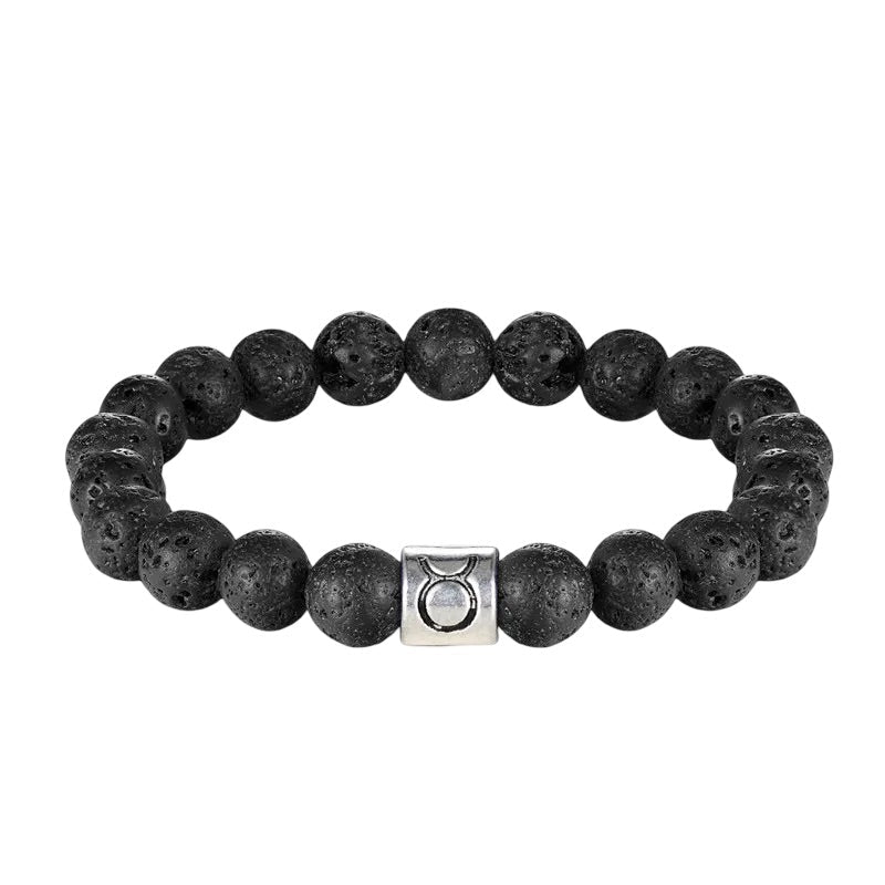 Bracelet élastique perles rondes en pierre de lave noire avec un bijou carré argenté gravé du symbole du Taureau.