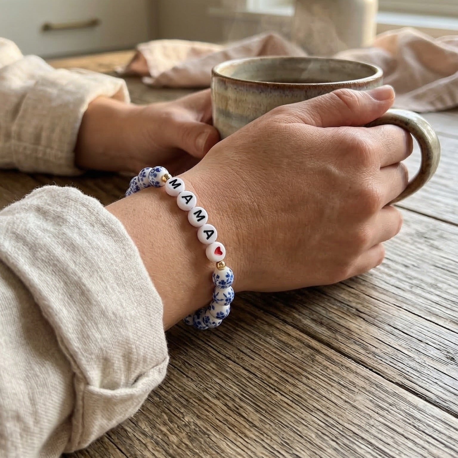 Blue and white porcelain bead bracelet, MAMA bracelet with heart, symbolic jewelry for mothers, letter bead bracelet celebrating maternal love, Ourlane model