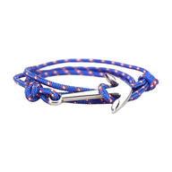 Bracelet cordon nautique bleu marine à motifs orange avec ancre en titane argenté multiple-tour.