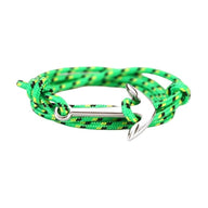 Bracelet nautique vert fluo à cordon nylon avec ancre argentée multiple-tour.