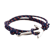 Bracelet cordon nautique bleu marine à pois rouges avec ancre en titane argentée multiple-tour.