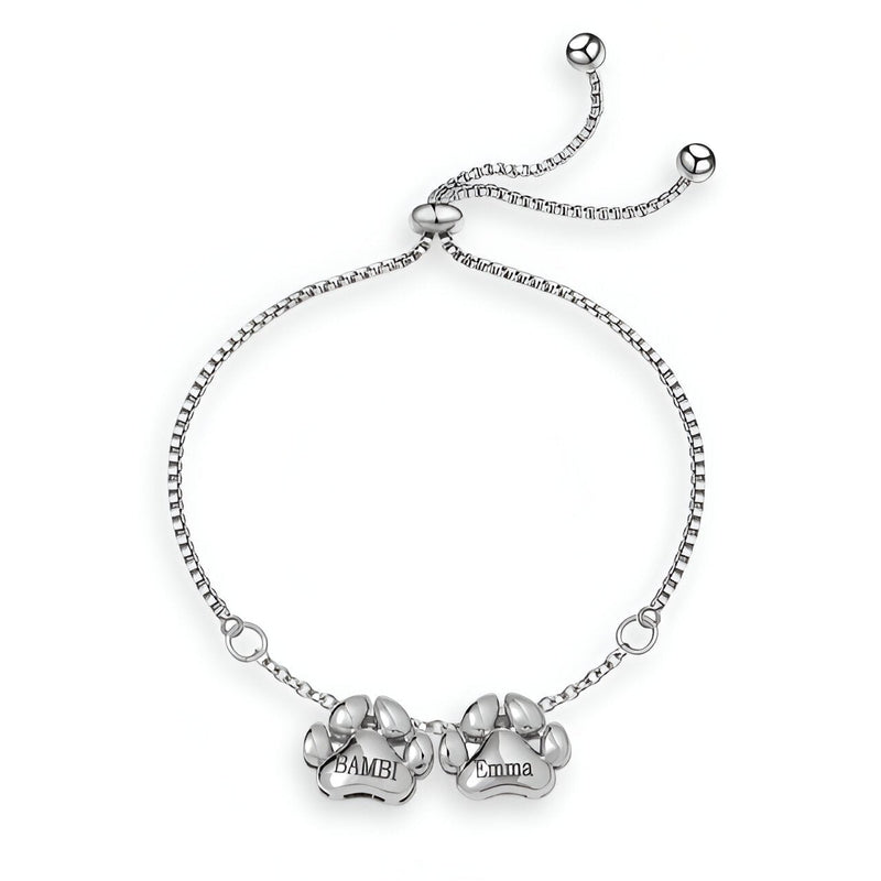 Bracelet fin en acier inoxydable argenté avec pendentifs pattes gravés "Bambi" et chaîne ajustable à coulisse.