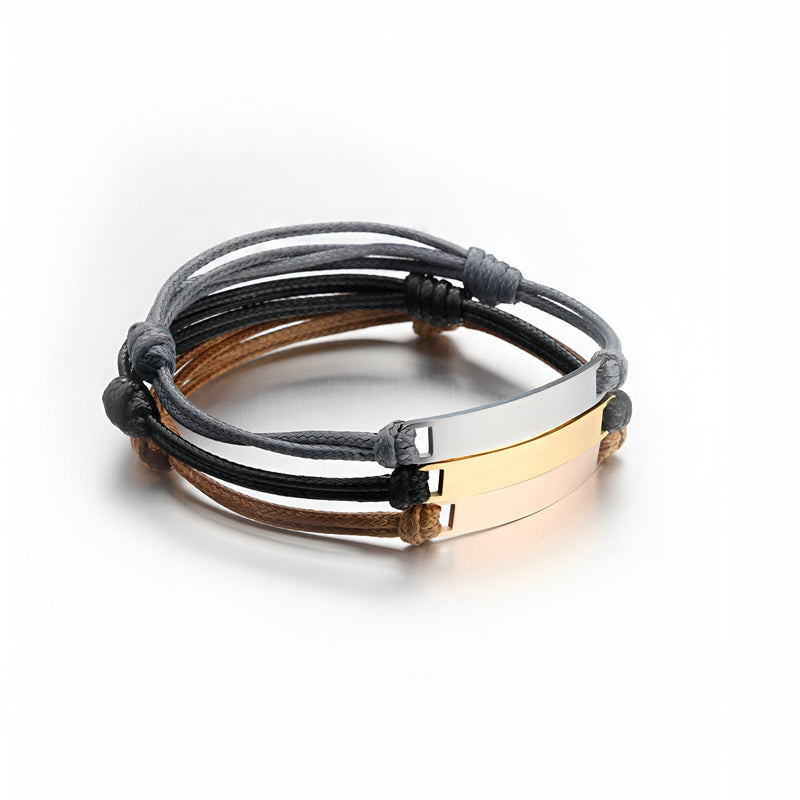 Bracelet Spotify personnalisé avec cordes noires et marron, plaques en acier inoxydable noir et or rosé.