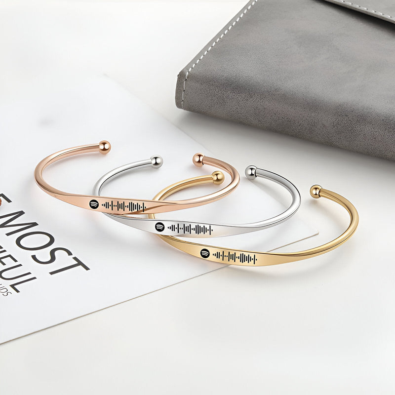 Bracelet jonc acier inoxydable personnalisé Spotify avec code musical, disponible en argent, or rosé et or.