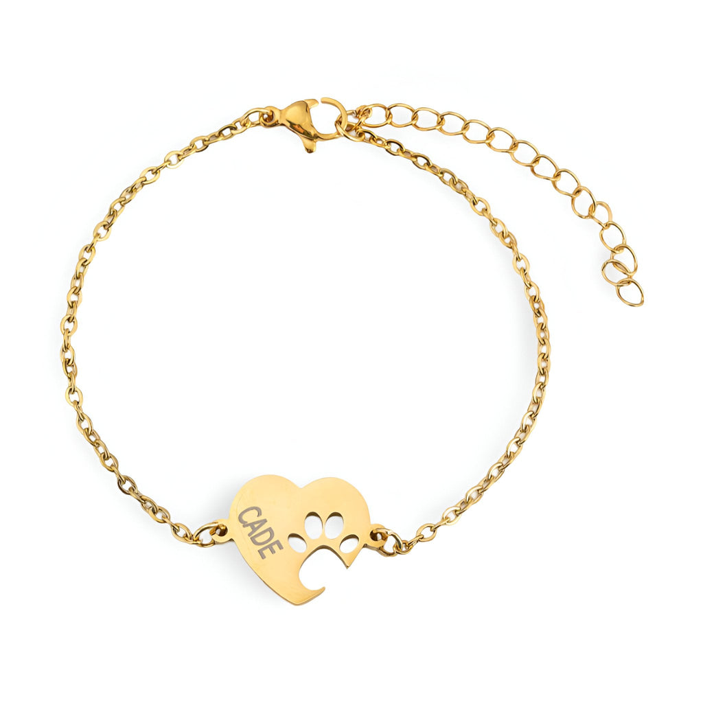 Bracelet en titane or avec cœur percé et empreinte de patte, chaîne fine réglable.