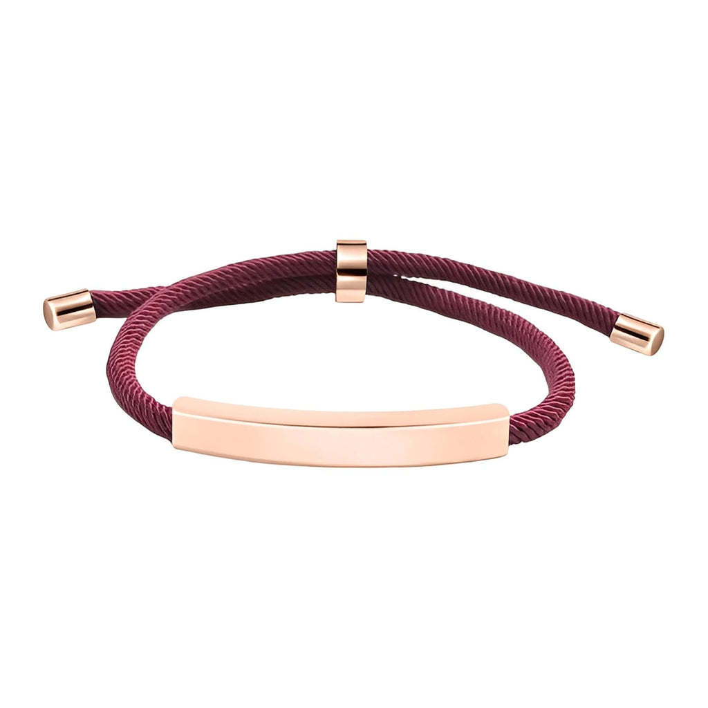 Bracelet en corde nylon bordeaux avec barre en acier inoxydable rose doré et fermoir coulissant ajustable.