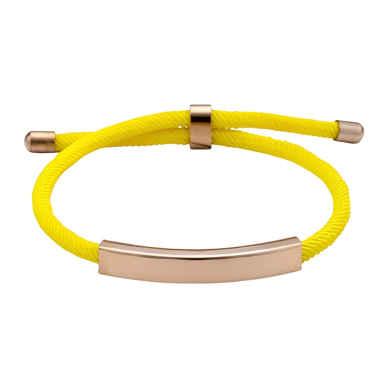 Bracelet cordon jaune en nylon avec barre lisse en acier inoxydable doré et fermoir coulissant.