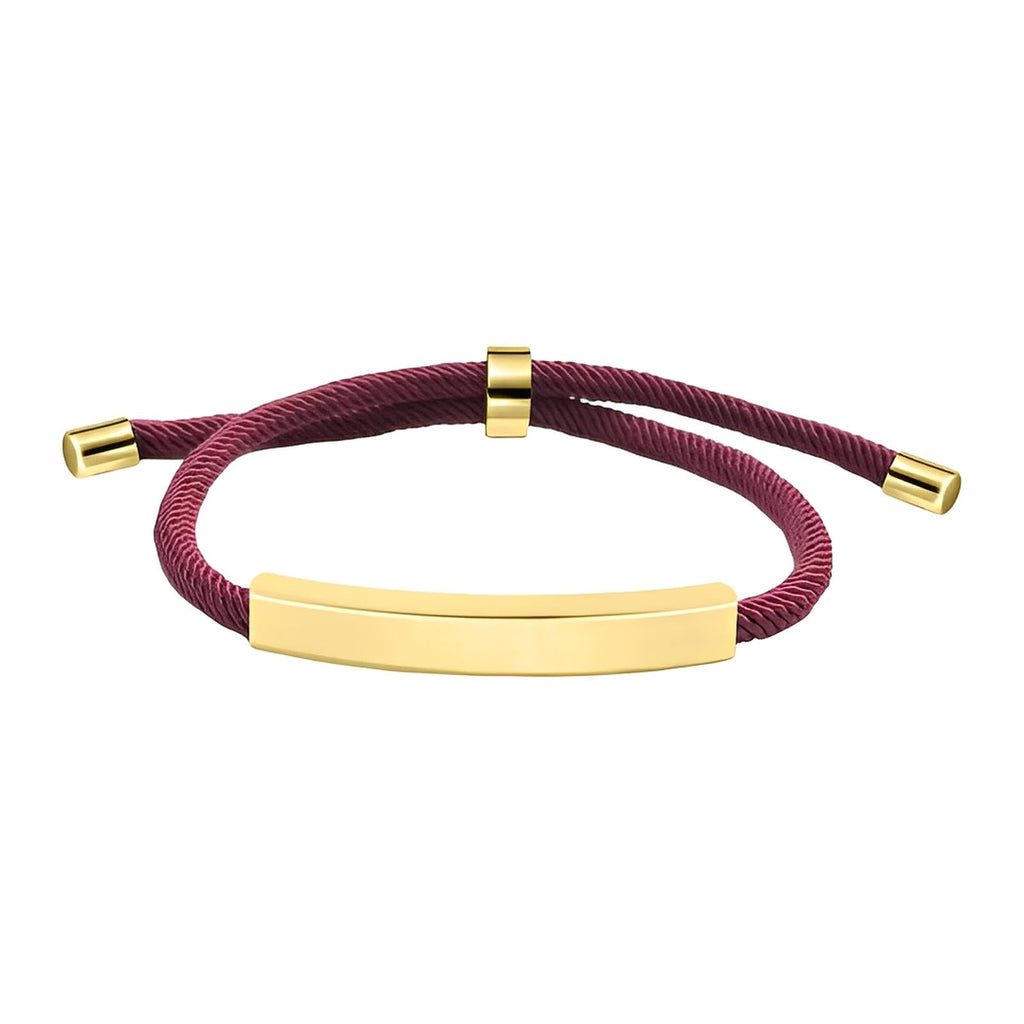 Bracelet cordon nylon bordeaux avec barre et embouts en acier inox doré, fermoir coulissant ajustable.