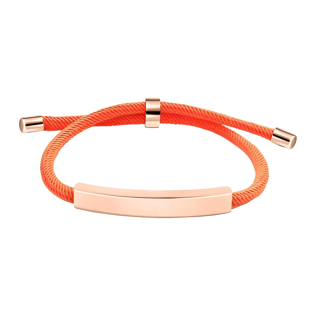 Bracelet cordon nylon orange avec barre et embouts en acier inoxydable doré rose, fermoir coulissant.