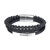 Bracelet homme double tour noir en cuir tressé avec perles volcaniques noires et plaque acier gravée.