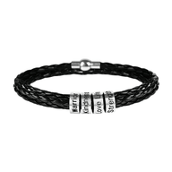 Bracelet triple tour en cuir noir tressé avec quatre anneaux argentés gravés « Warrior », « Love », « Hope », « Strength ».