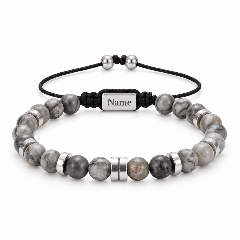 Packshot studio bracelet Kalere Agate grise, vue de face sur fond blanc. — gravure source restaurée 8 octobre 2026