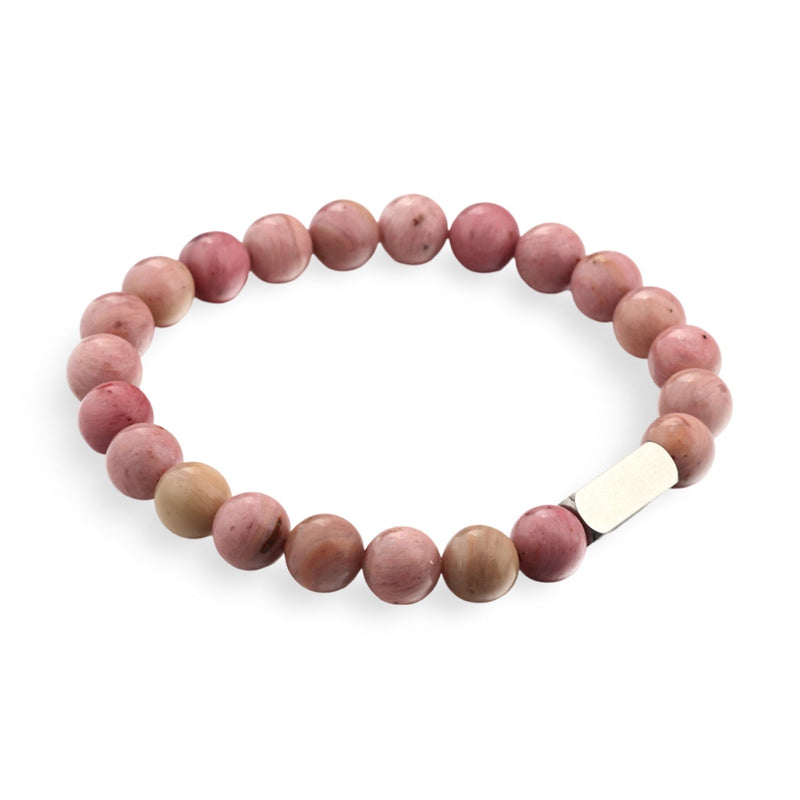 Bracelet mixte en perles rondes rose clair en jaspe avec fermoir métallique argenté lisse.
