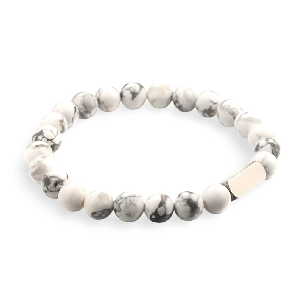 Bracelet mixte pierres naturelles blanches veinées grises avec détail métallique argenté.