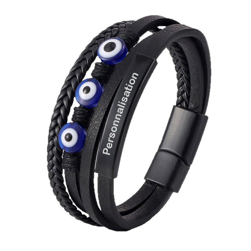 Bracelet en cuir noir multi-rangs avec trois yeux protecteurs bleus et fermoir magnétique noir mat.