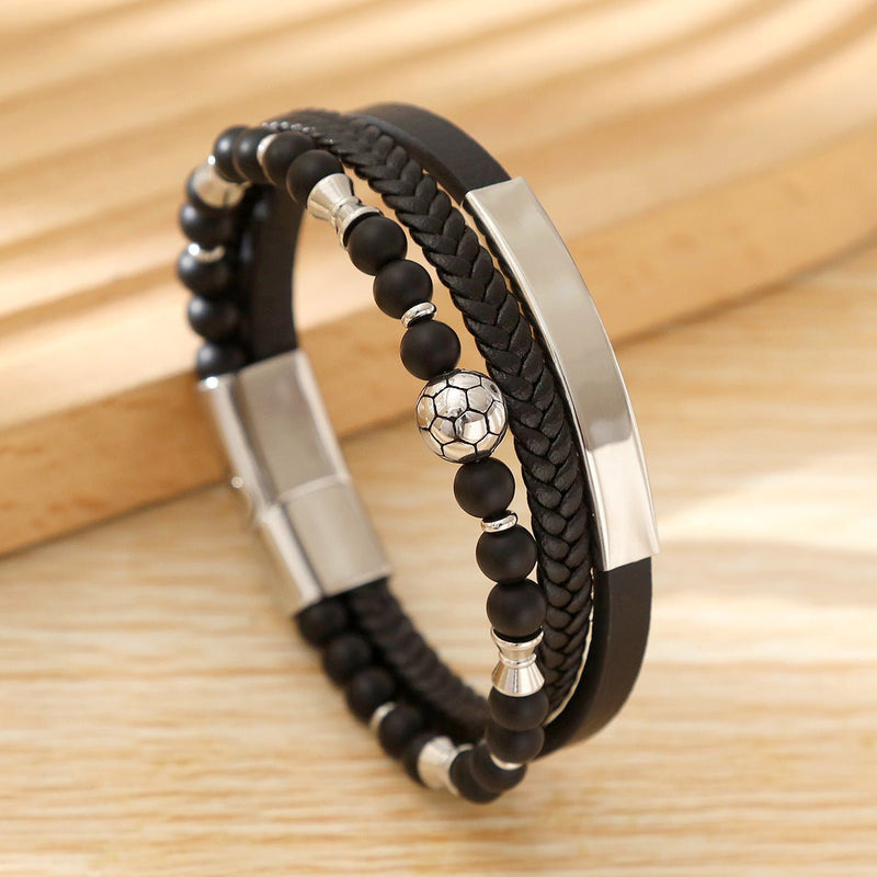 Bracelet masculin noir avec cuir tressé, perles noires et blanche football, fermoir magnétique acier inoxydable.
