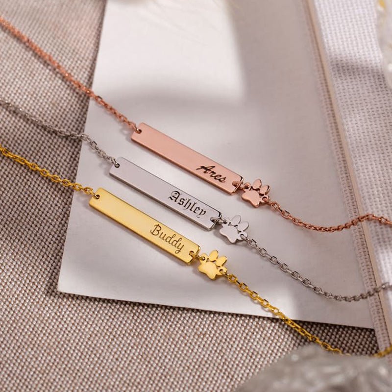 Bracelets fins en acier inoxydable rose, argent et or avec plaques gravées et pendentif patte d’animal assorti.