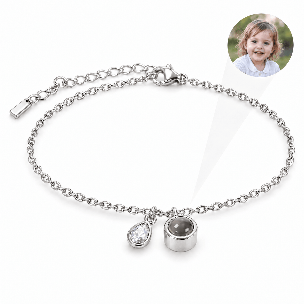 Bracelet photo personnalisé, acier inoxydable, avec pierre de naissance en goutte, cadeau intime et unique, modèle Ruliqua — Avril / Argent — packshot studio photo-projection nette
