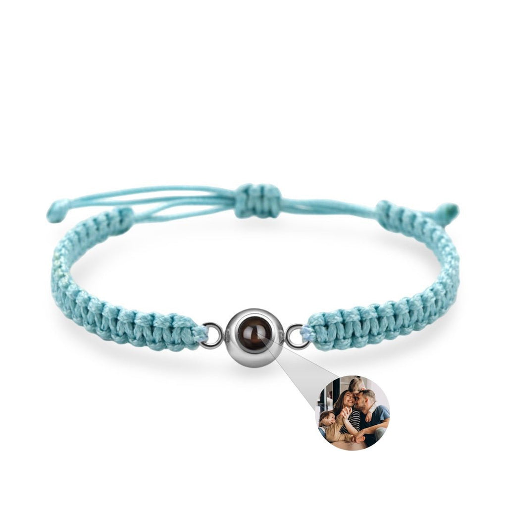 Bracelet corde bleu ciel avec perle centrale en titane et pendentif photo rond personnalisable.