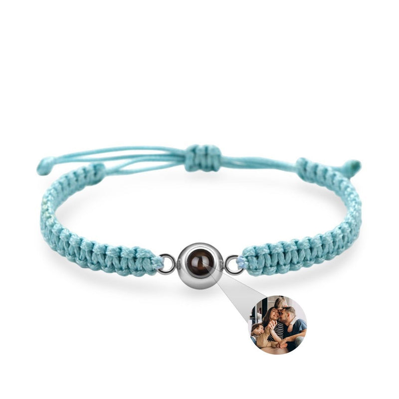 Bracelet corde bleu ciel avec perle centrale en titane et pendentif photo rond personnalisable.