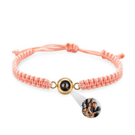 Bracelet corde rose avec médaille en titane or rosé et insert photo personnalisable.