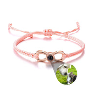 Bracelet corde rose avec pendentif infini en titane or rosé et photo personnalisée ronde.
