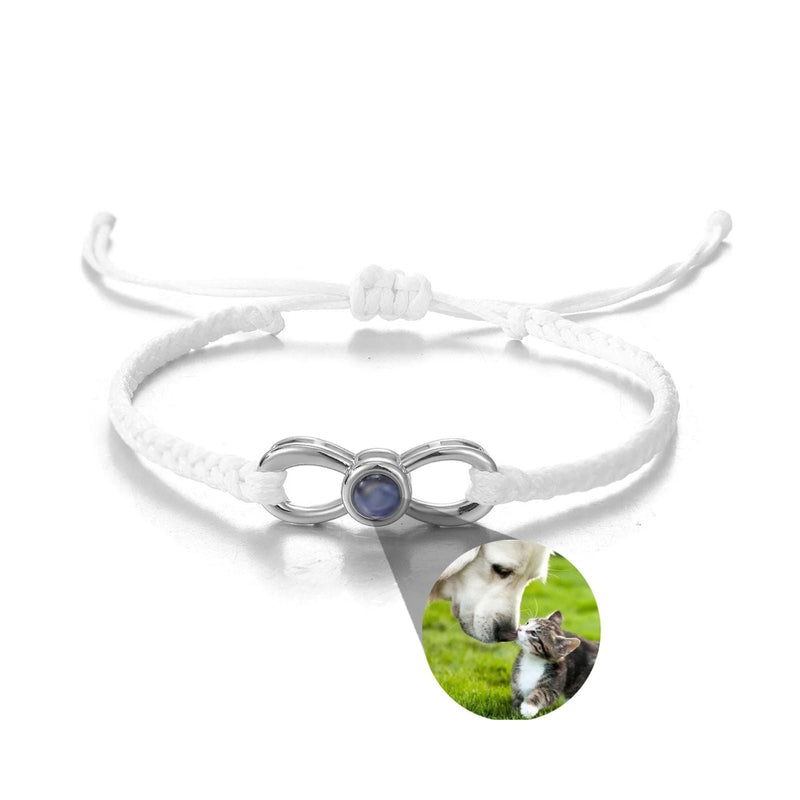 Bracelet corde blanc avec signe infini en titane argenté et médaille photo ronde personnalisée.